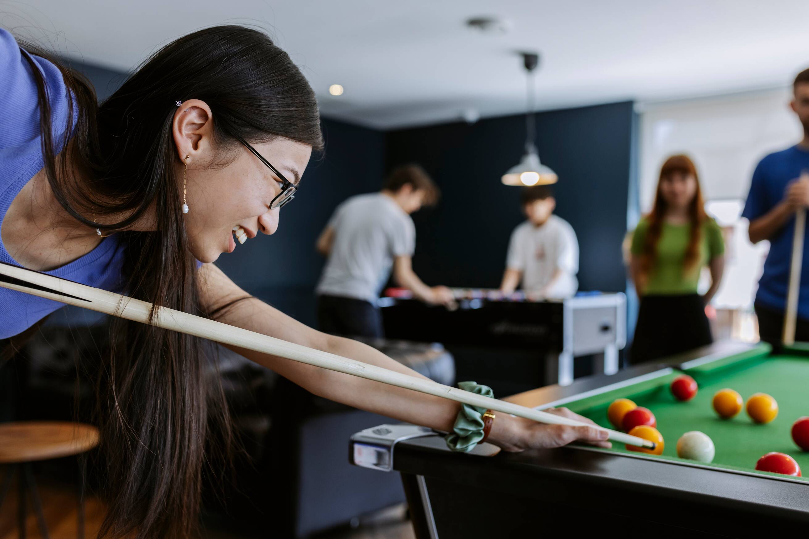 Student playing pool