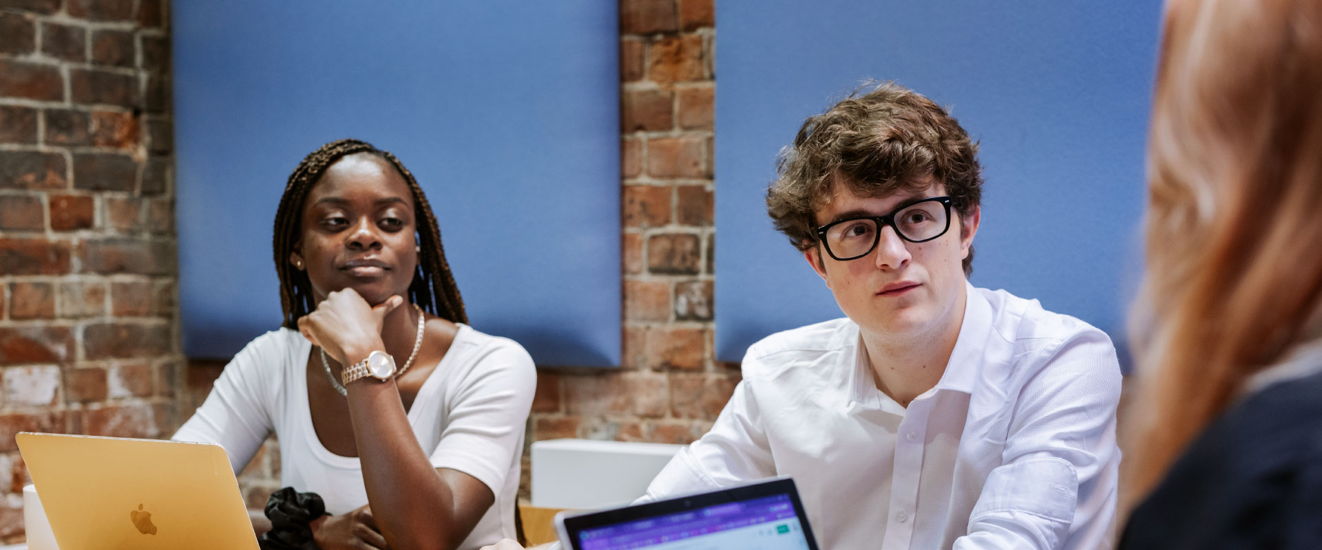 Students in an office meeting