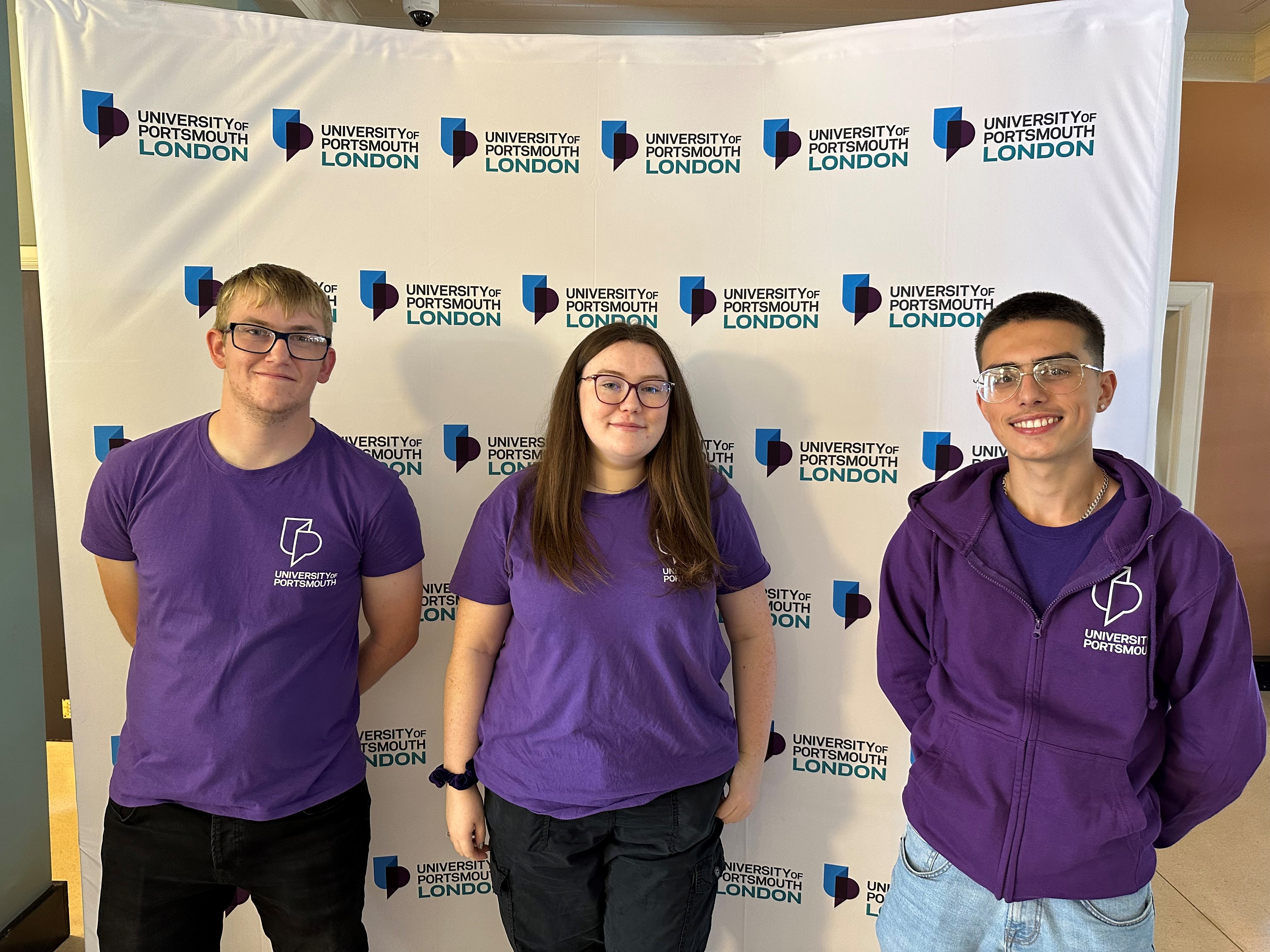 3 student ambassadors standing