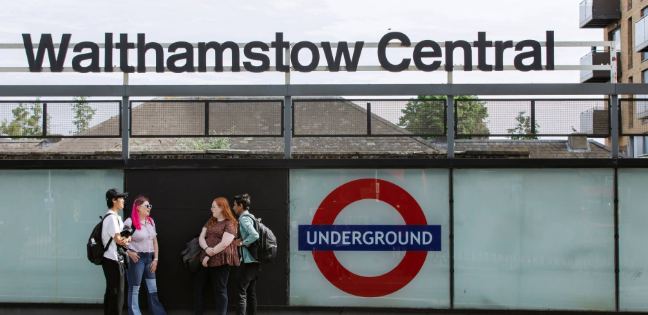 Walthamstow Central train station with student chatting outside
