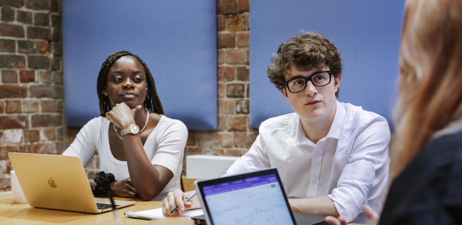 Students in an office meeting